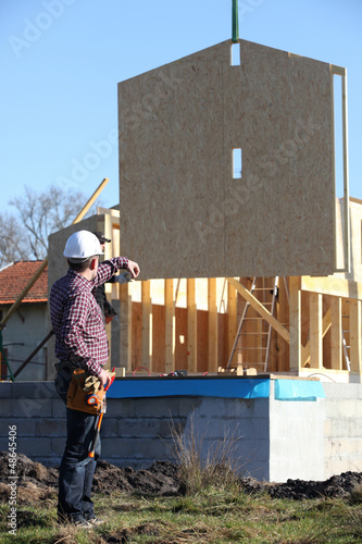 Photo: Foreman directing crane Foreman directing crane