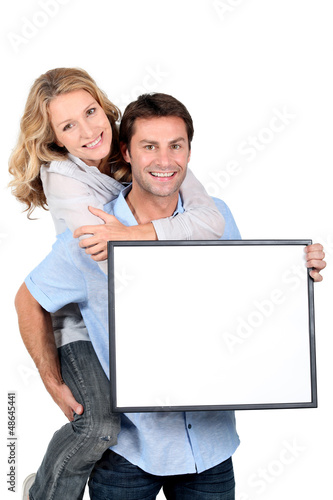 Photo: Boy carrying girl Boy carrying girl