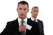Businessman receiving card