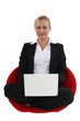 Businesswoman sat cross-legged