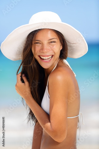 Photo: Beach woman smiling laughing Beach woman smiling laughing