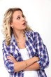 surprised young woman standing with crossed hands