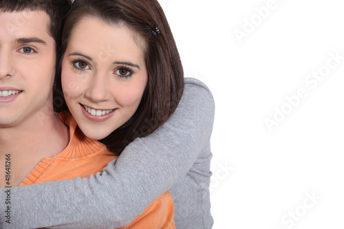 Photo: Young couple in a loving embrace Young couple in a loving embrace