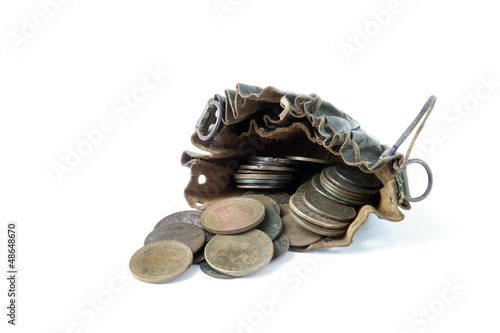 Photo: Coins in an old leather pouch Coins in an old leather pouch