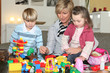 Grandmother playing with her grandchildren
