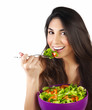 Woman eating salad