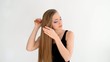 girl combing of her hair