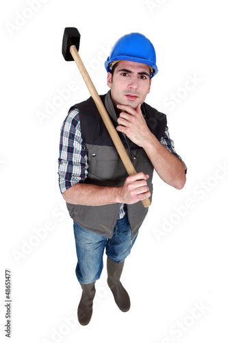Photo: Pensive builder Pensive builder