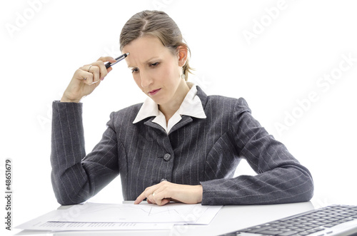 Photo: Woman studying documents Woman studying documents