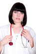 Worried doctor with a stethoscope around her neck