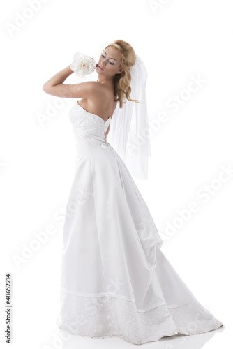 Photo: pretty blonde bride turned of three quarters pretty blonde bride turned of three quarters