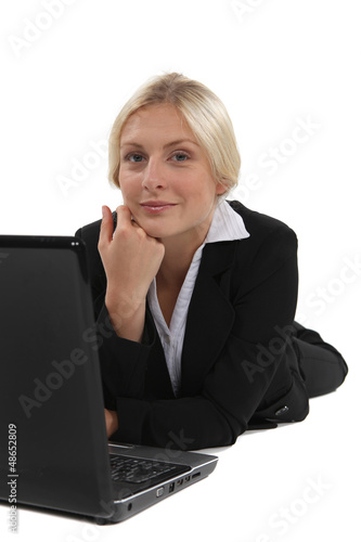 Photo: Businesswoman using her laptop Businesswoman using her laptop