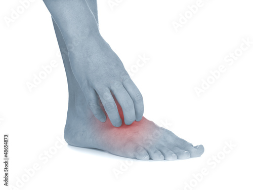 Photo: Women scratch itchy leg with hand. Women scratch itchy leg with hand.