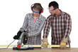 Apprentice with circular saw