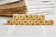 Letter Dices Concept: Public Relations