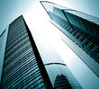 modern glass silhouettes of skyscrapers at night
