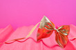 Foto: rosa pink altrosa hintergrund mit goldener schleife rosa pink altrosa hintergrund mit goldener schleife