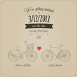 Grunge retro wedding invitation with tandem vintage bicycles