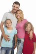 Foto: portrait of young happy caucasian family standing together with portrait of young happy caucasian family standing together with