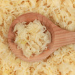 Photo: Frisches Sauerkraut auf einem Holzlöffel Frisches Sauerkraut auf einem Holzlöffel