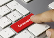 Censored keyboard key. Finger