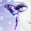 beautiful woman eye close up with butterfly wings