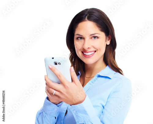 Photo: Woman with a cell phone. Woman with a cell phone.