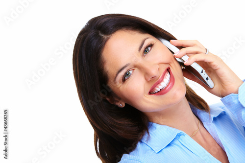 Photo: Woman with a cell phone. Woman with a cell phone.