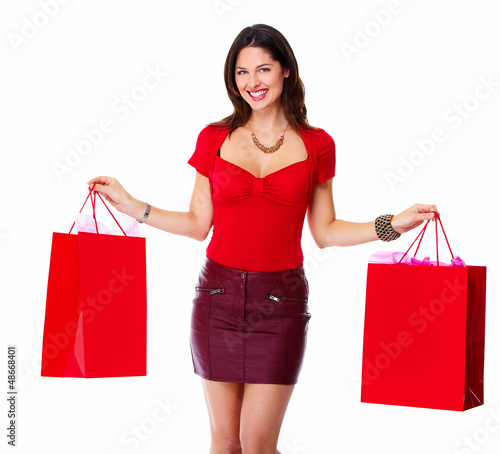 Photo: Beautiful woman with a shopping bags. Beautiful woman with a shopping bags.