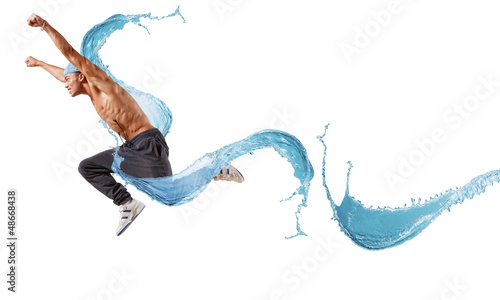 Photo: young man dancing hip hop with color lines young man dancing hip hop with color lines