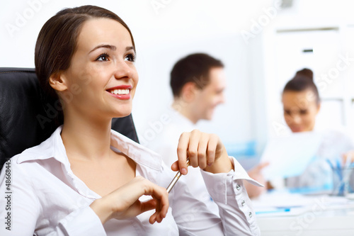 Photo: Young businesswoman in the office Young businesswoman in the office