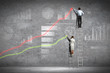 businesspeople drawing diagrams on wall