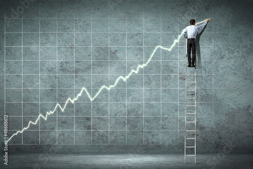 Photo: businessman drawing diagram businessman drawing diagram