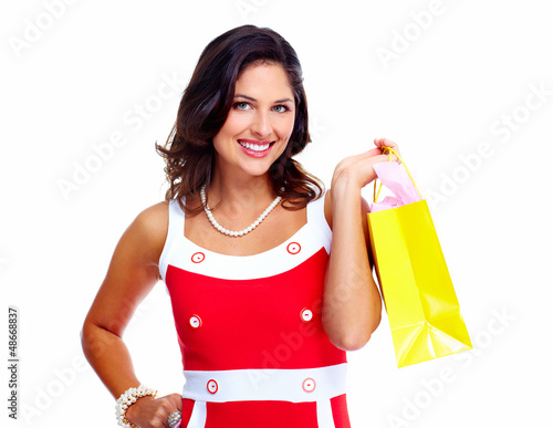 Photo: Beautiful woman with a shopping bags. Beautiful woman with a shopping bags.