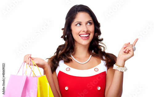 Photo: Beautiful woman with a shopping bags. Beautiful woman with a shopping bags.