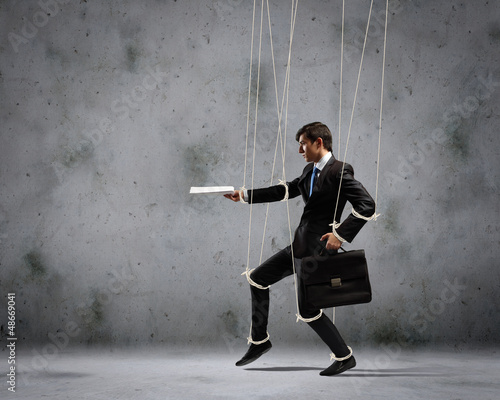 Photo: Puppet businessman Puppet businessman