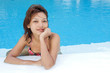 Foto: Young woman in the pool Young woman in the pool