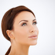 Beautiful serene woman daydreaming