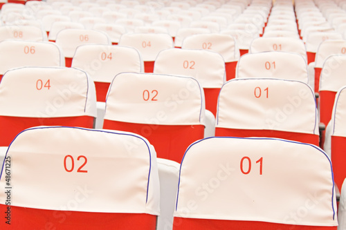 Photo: rows of chairs in a theater rows of chairs in a theater