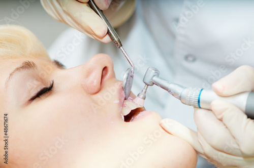 Photo: dentist healthcare teeth polishing work dentist healthcare teeth polishing work