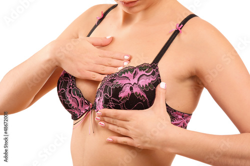 Photo: Breast cancer - Woman holding her breast Breast cancer - Woman holding her breast