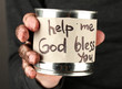 homeless man asks for help, on black background close-up