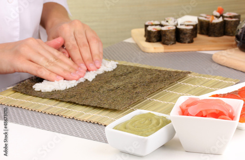 Photo: Making rolls Making rolls