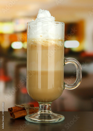 Photo: Fragrant coffee latte in glass cup with vanilla pods, Fragrant coffee latte in glass cup with vanilla pods,