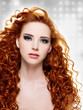 Photo : Beautiful woman with long curly hairs Beautiful woman with long curly hairs