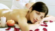 Gorgeous happy woman in spa relaxed