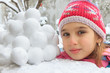 Photo: Girl with snowballs Girl with snowballs