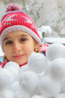 Photo: Girl with snowballs Girl with snowballs