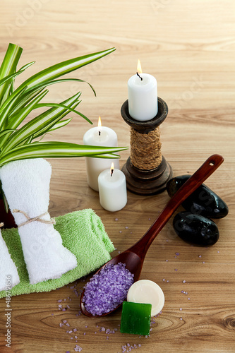 Photo: Spa with towels with a candle and other accessories Spa with towels with a candle and other accessories
