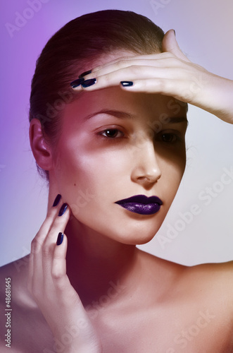 Photo: beautiful caucasian young woman with glamour make-up beautiful caucasian young woman with glamour make-up